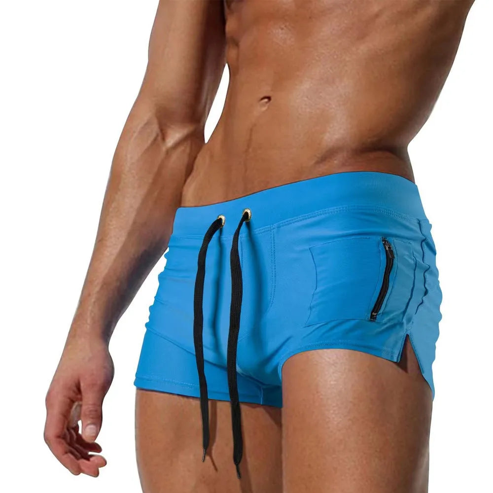 Men's black high waist tight lace-up swimming trunks made from polyester with spandex lining.