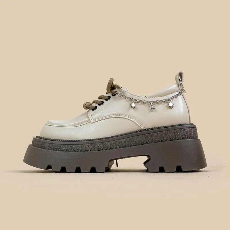 White women's platform leather shoes with chunky heel and front lace-up, round toe.