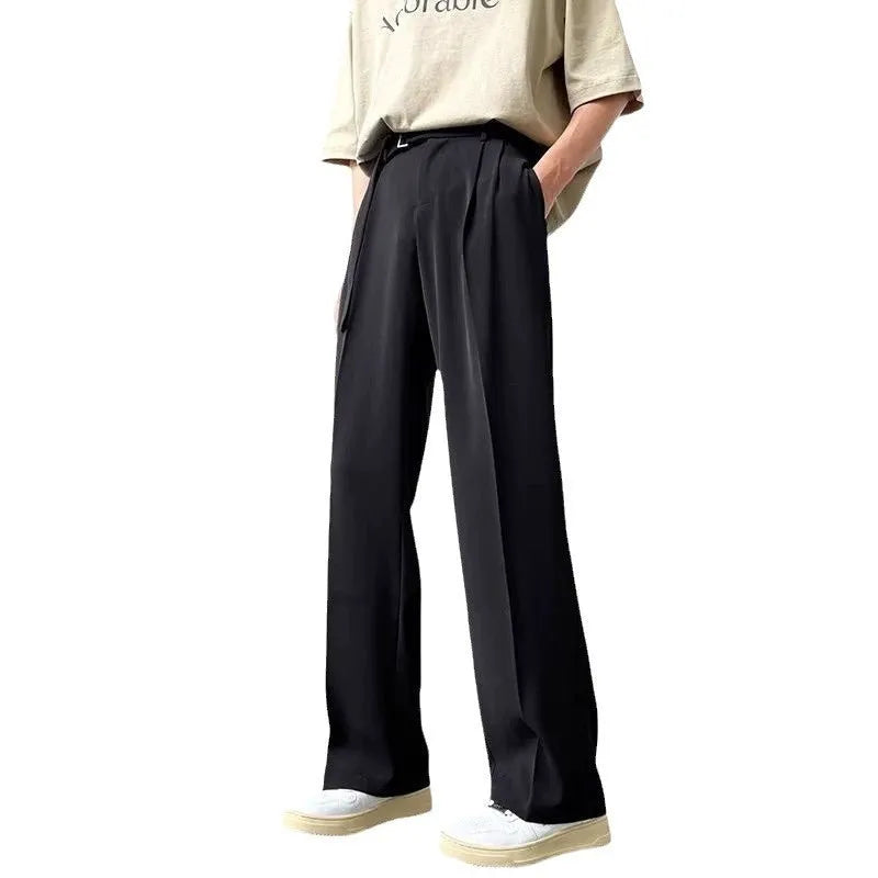 Black thin straight wide leg casual trousers with a loose fit and straight leg opening.