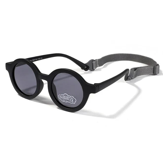 Soft silicone round-frame sunglasses for babies and toddlers aged 0-3 years with polarised UV400 lenses.