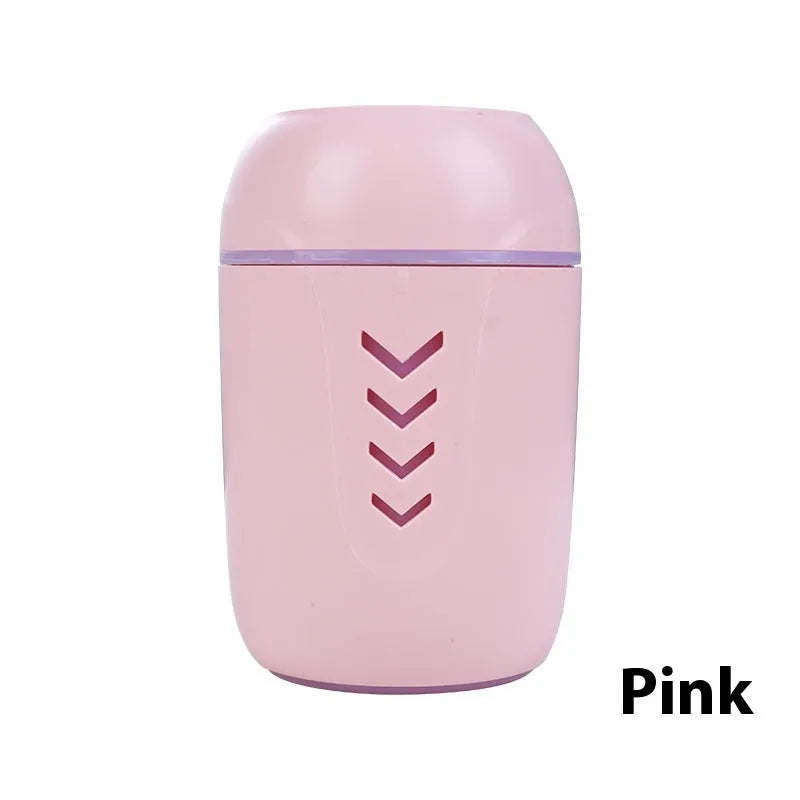 Round white portable air purifier with aromatherapy function for car, home, and office use.