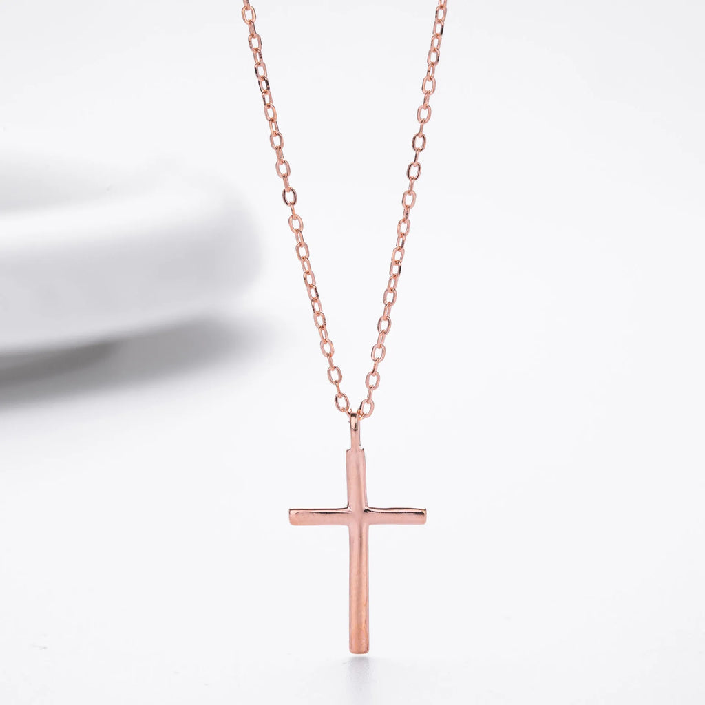 Sterling silver cross pendant necklace on an adjustable O-chain in gold, platinum, or rose gold plating.