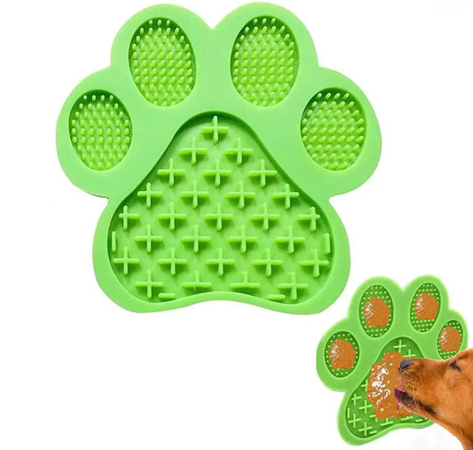 Blue bone-shaped silicone dog licking mat with suction cups on the back for sticking to smooth surfaces.