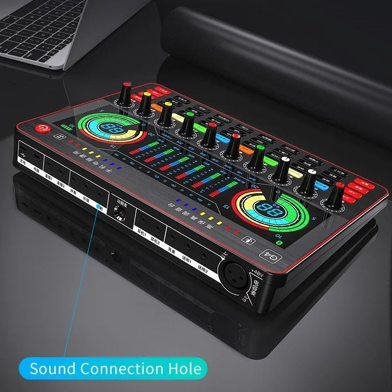 G4 professional audio sound card mixer with colour LCD screen, multiple knobs, and a microphone on a black background.