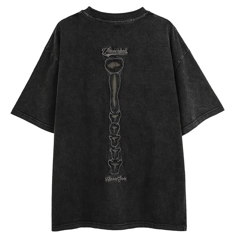 Black cotton t-shirt with skull and letter graphic, drop-shoulder sleeves, loose fit