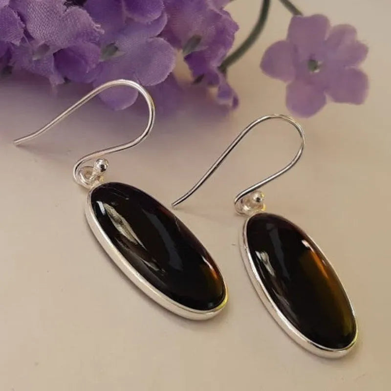 Women's geometric earrings with oval black agate pendants and Chinese style design on silver electroplated alloy
