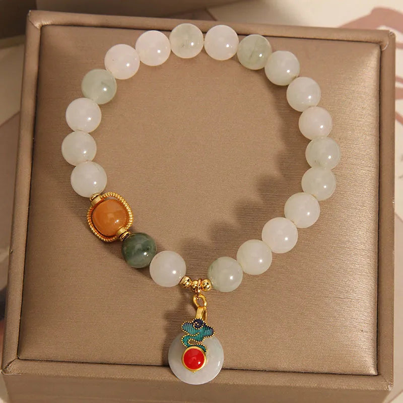 Ice jade women's bracelet with pearl accents and Xiangyun peace jade buckle design