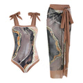 Floral print one-piece swimsuit with mesh tube top and detachable skirt in brown colour