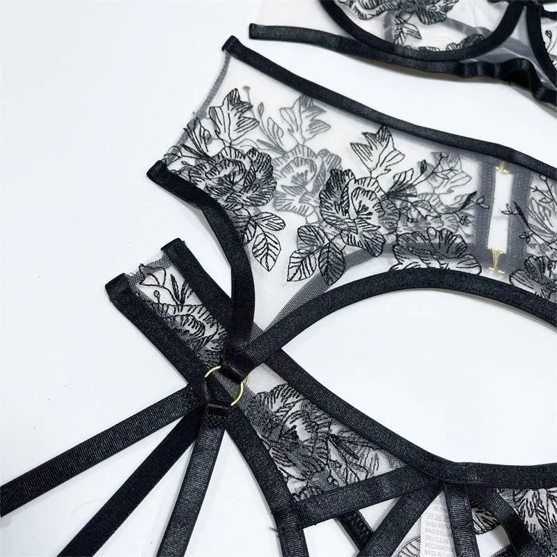 Women's black lace mesh three-piece set with floral print showing top, pants and waist ring