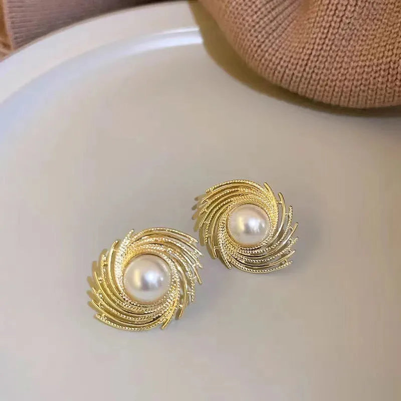 Women's vintage style flower earrings with pearl elements and electroplated alloy construction