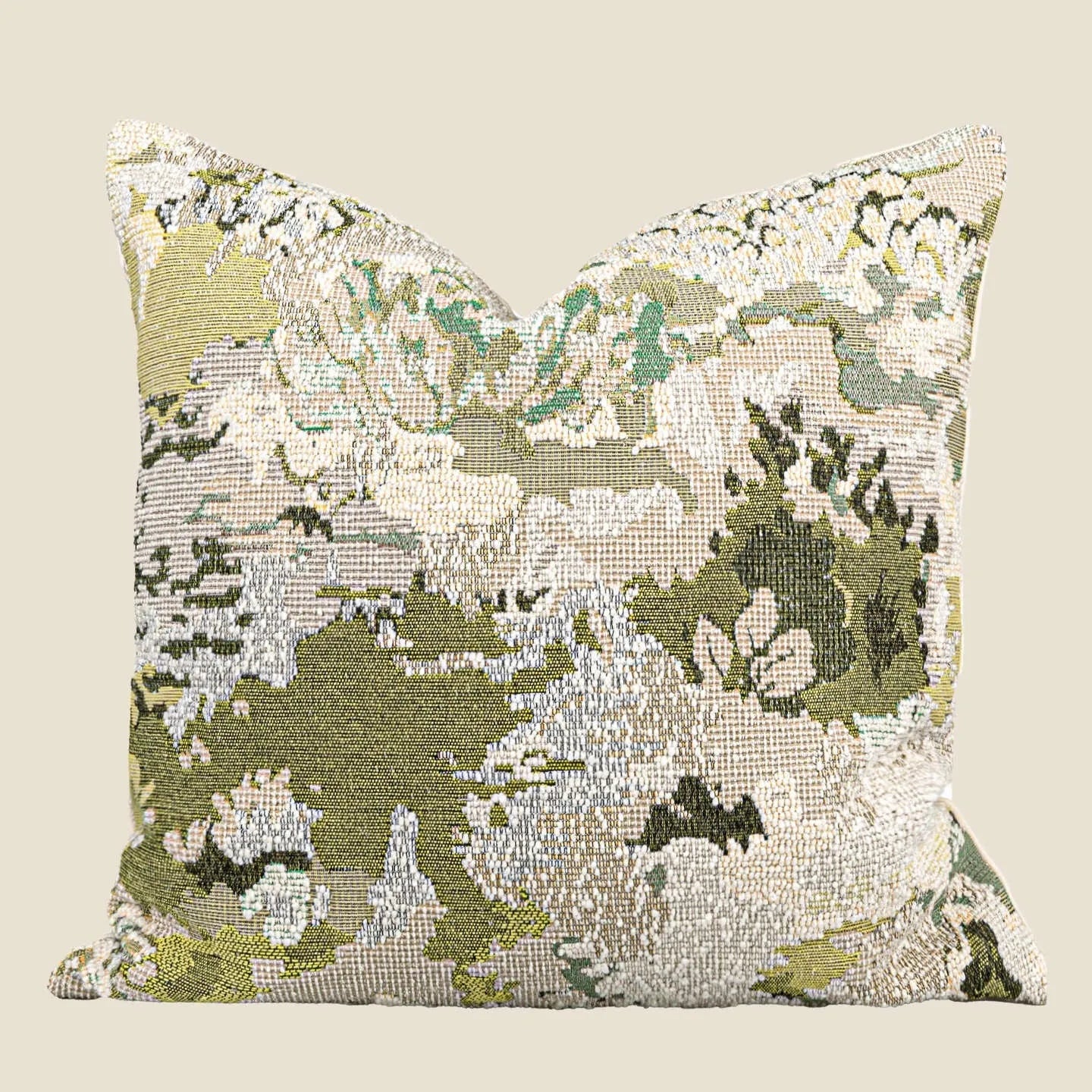 Antique green wool blend decorative pillow with abstract floral pattern, shown in lumbar and square sizes.