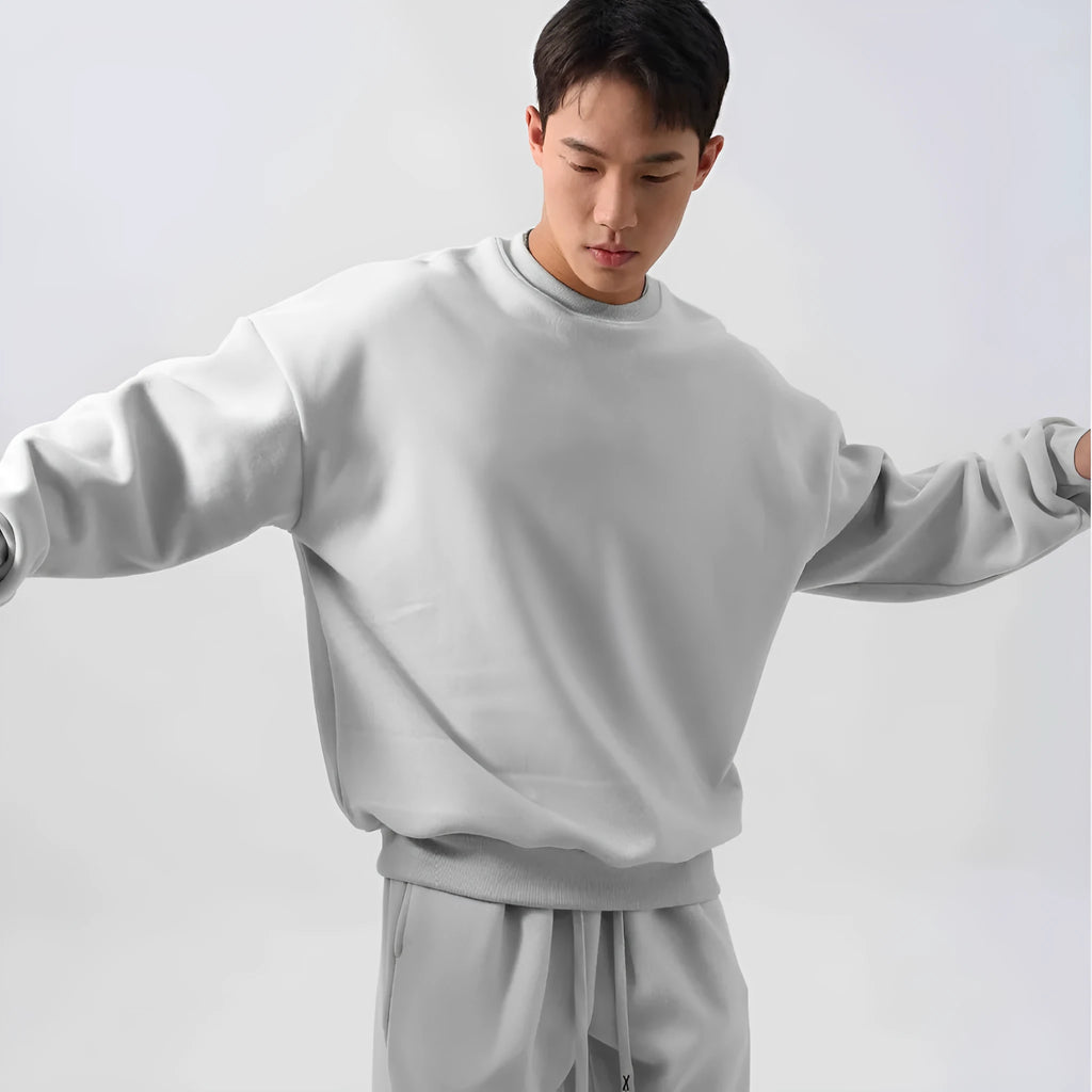 Men's black polar fleece sports suit with padded crew-neck coat and matching trousers