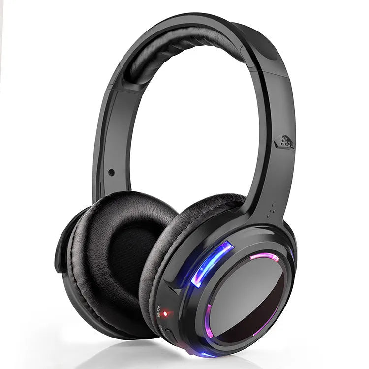 Black silent disco wireless headphones with over-ear design and 3.5mm cable.