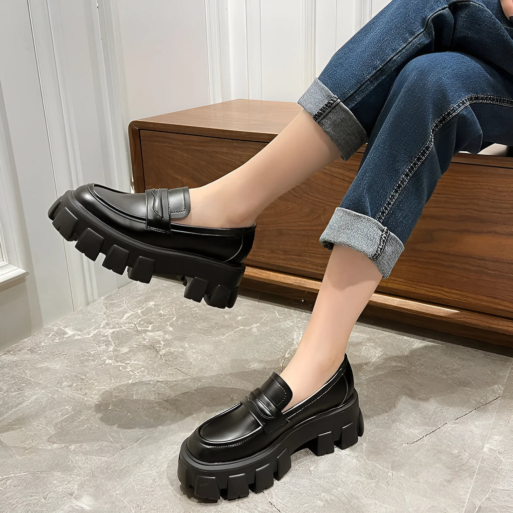 British style wide fit loafers in patent leather with a rubber sole