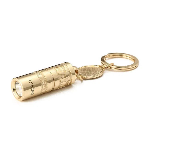 Gold-coloured zinc alloy keychain torch with LED light on a keyring.