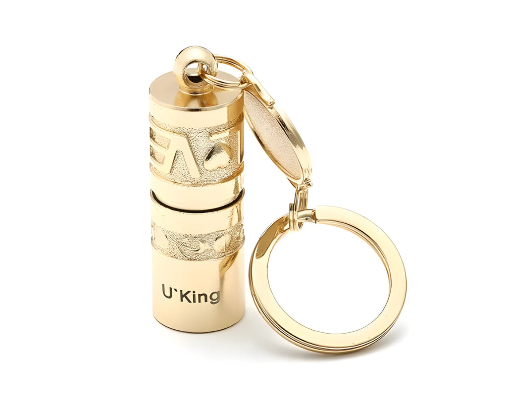 Gold-coloured zinc alloy keychain torch with LED light on a keyring.