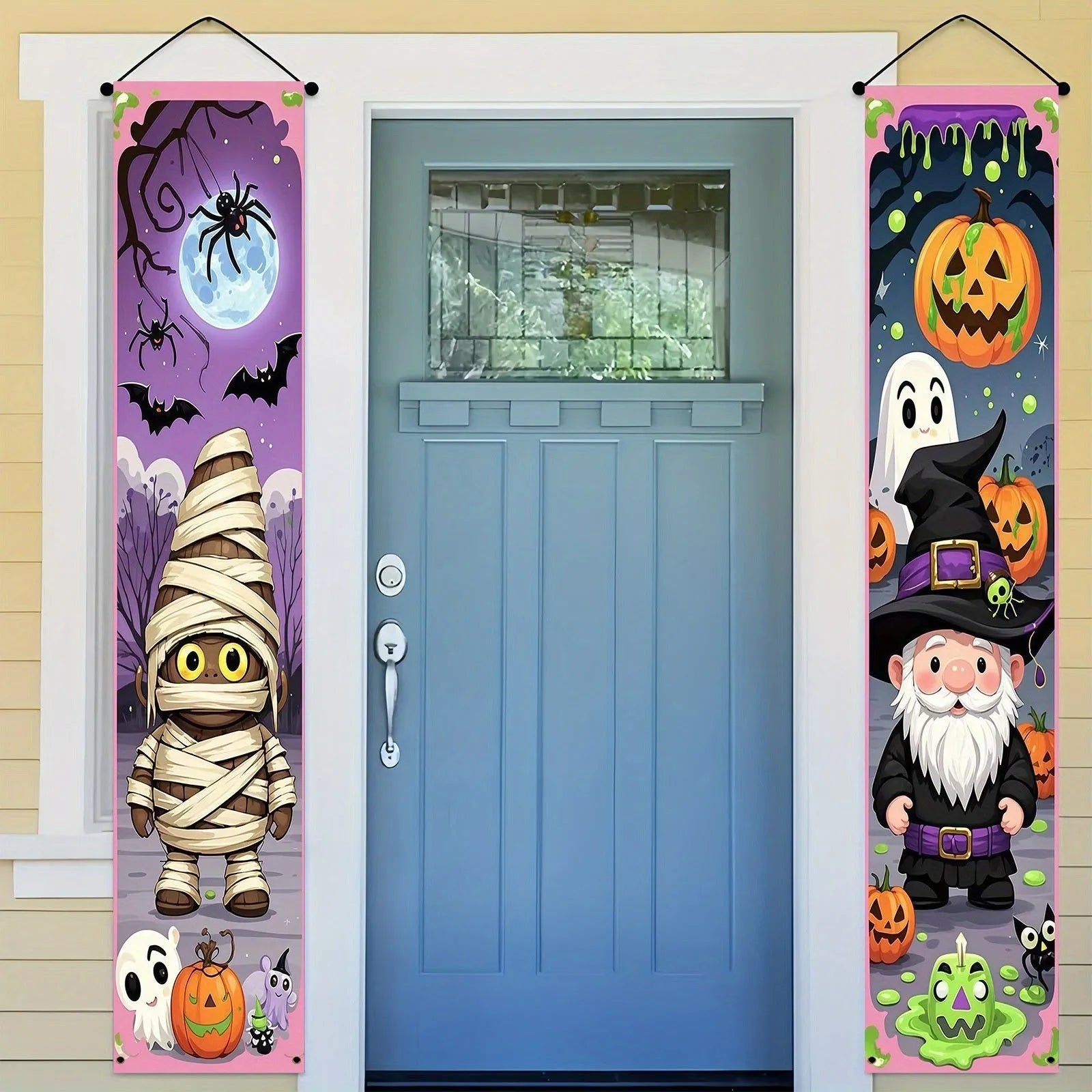 A pair of long Halloween-themed polyester banner decorations hanging on a wall.