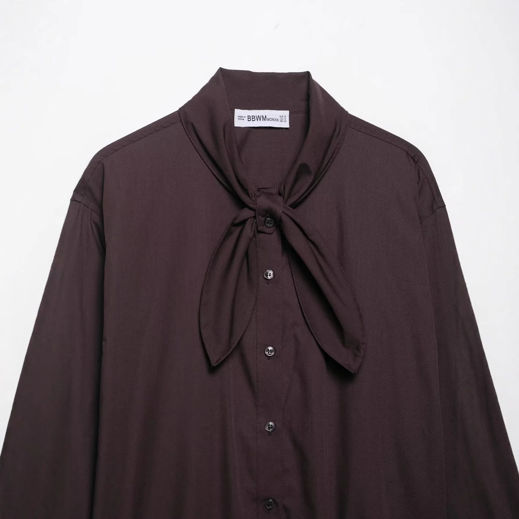 Brown women's polyester poplin shirt with long sleeves and scarf bow tie detail