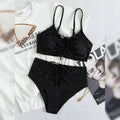 Black women's high-waisted bikini with sling split shorts and sleeveless top