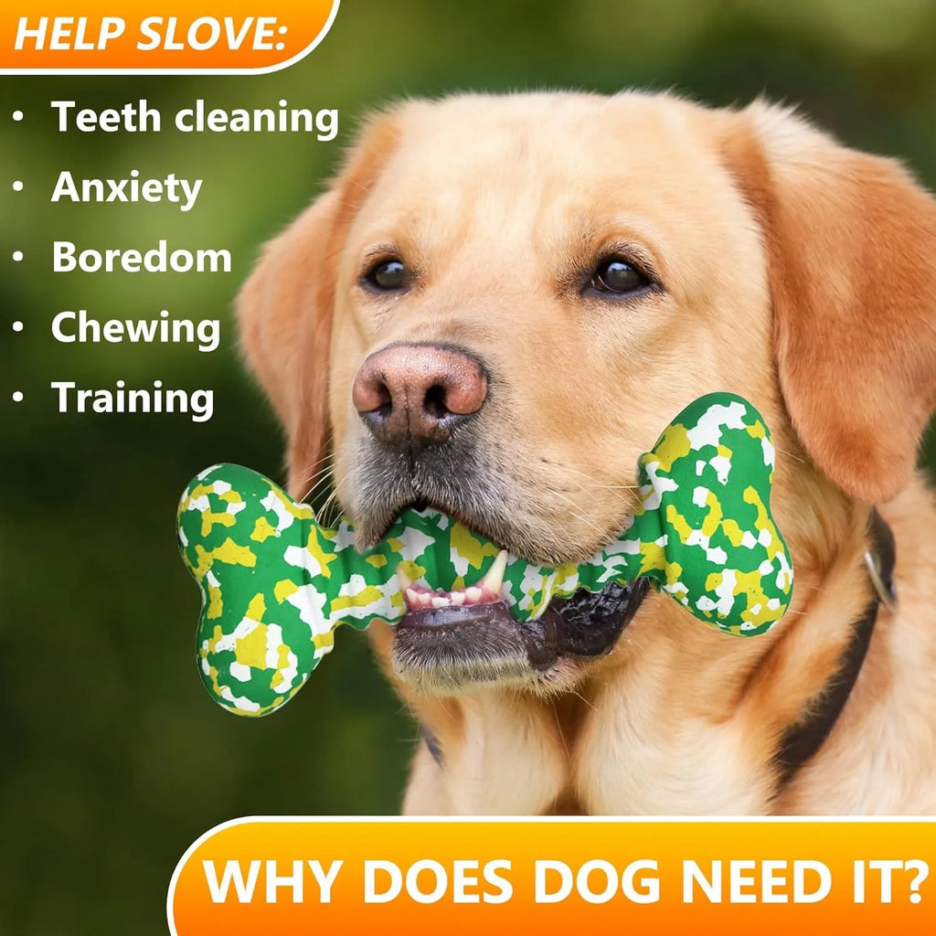 Green and white camouflage patterned natural rubber bone-shaped dog chew toy for large dogs on a wooden floor.