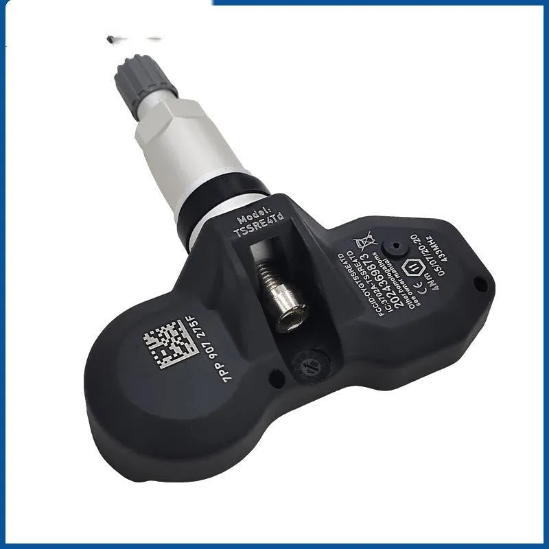 Black Audi tyre pressure monitoring sensor with valve stem for direct factory replacement