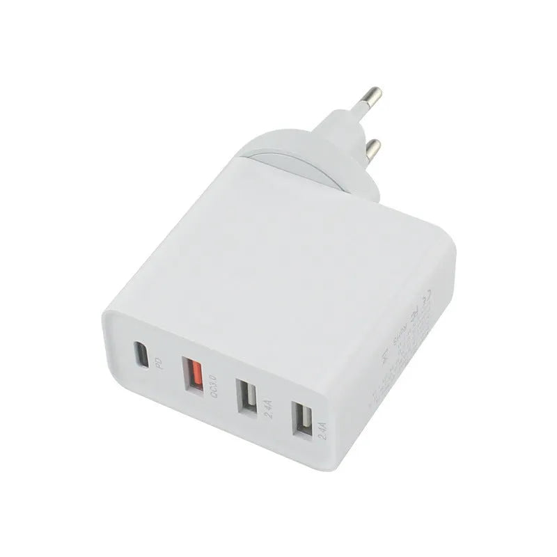 Black 48W four-port USB-C desktop charger with UK plug on a white background.