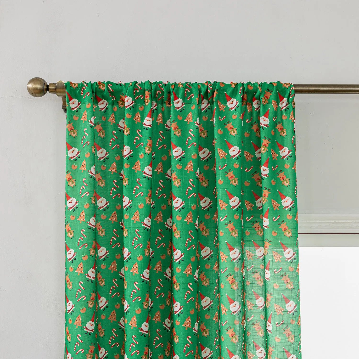 Christmas snowman angel print curtain in green colour with cartoon figures pattern