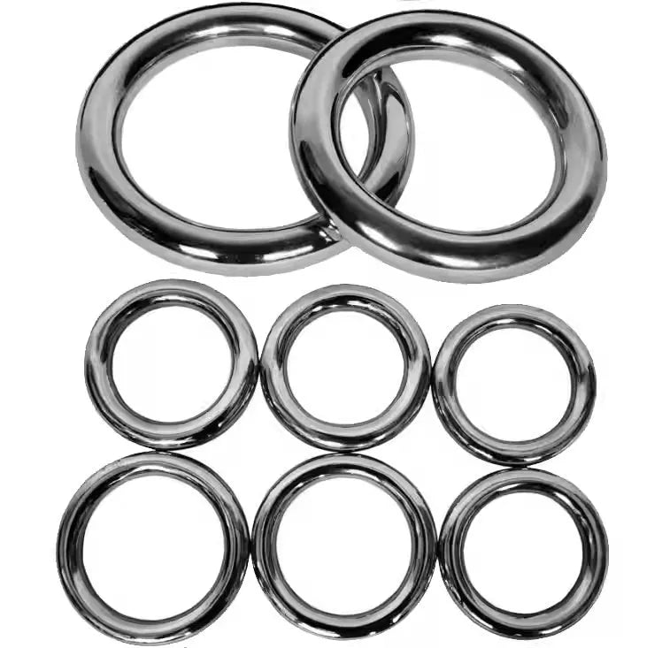 Iron Arm Skill Wing Chun carbon steel power training ring in three sizes on a plain background.