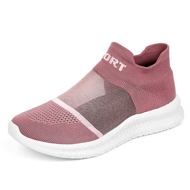 Casual grey Flyknit sock shoes with laces and a low-top MD sole, shown on a foot.