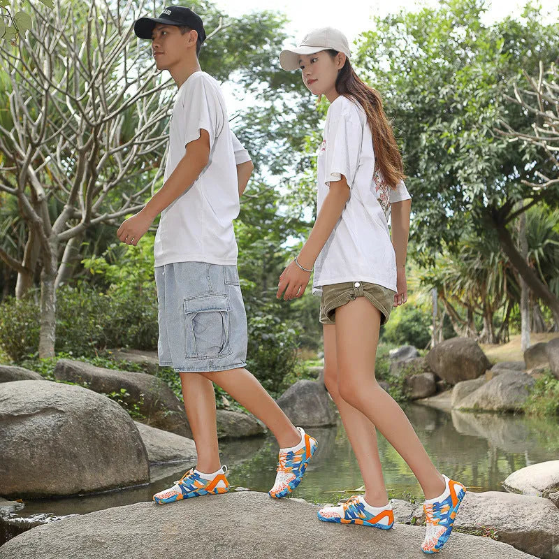 Men's and women's quick-drying mesh wading shoes in various colours on a non-slip rubber sole.