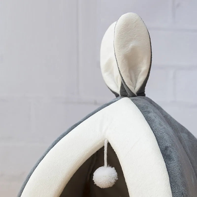 Rabbit ear Mongolian nest pet bed in Arctic velvet with PP cotton, shown in Grey and Pink, sizes S to XL