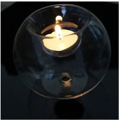 Round hollow glass candle holder showing handcrafted European-style spherical design