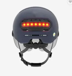 Cycling helmet with integrated LED brake light and running lights in black PC shell