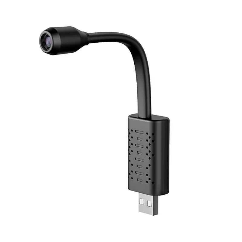 Slim black V380 wireless USB HD camera on a table showing its compact 158mm length design.