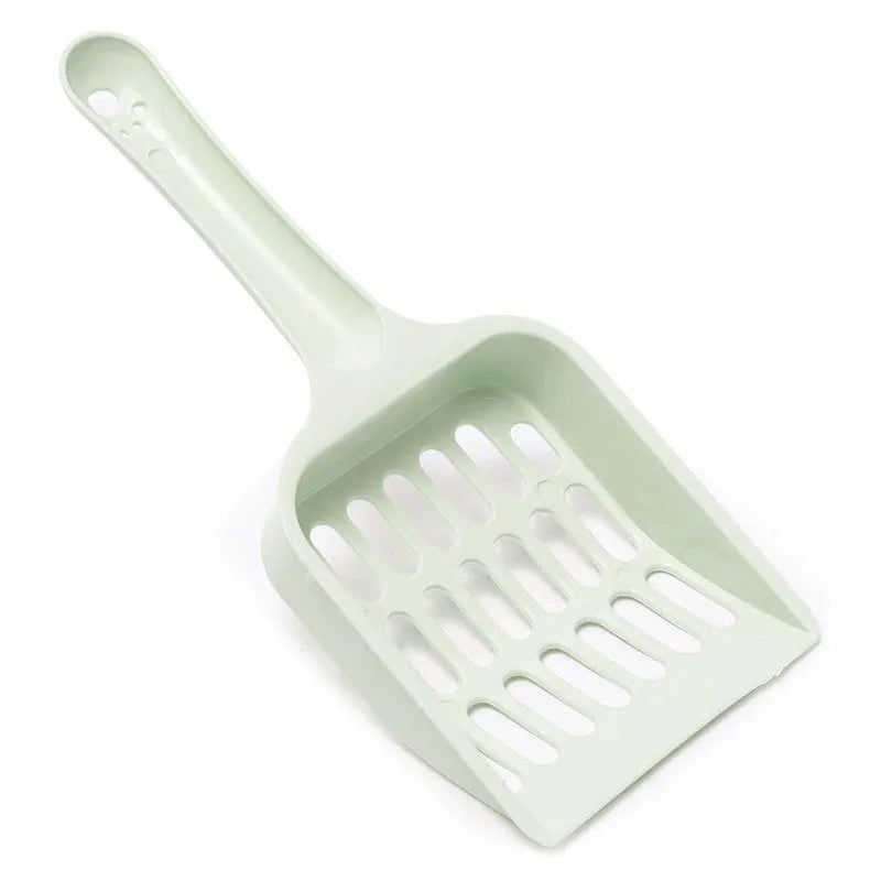 Plastic cat litter scoop measuring 20cm long with blue, green and pink colour options