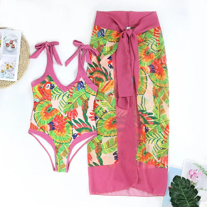 Women's pink floral print retro swimsuit with V-neck and matching skirt