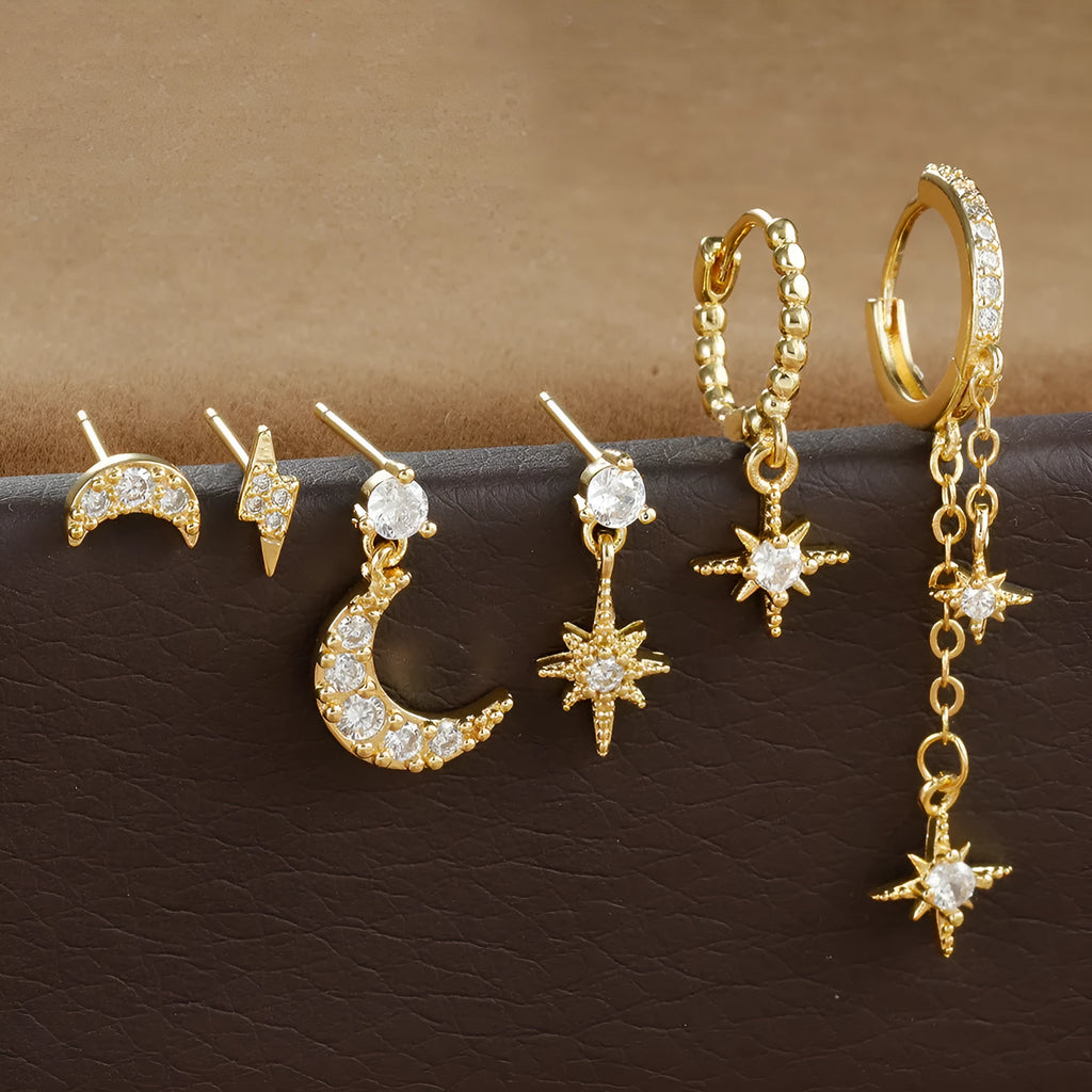 Set of six gold-coloured chain tassel earrings with zircon studs for women.