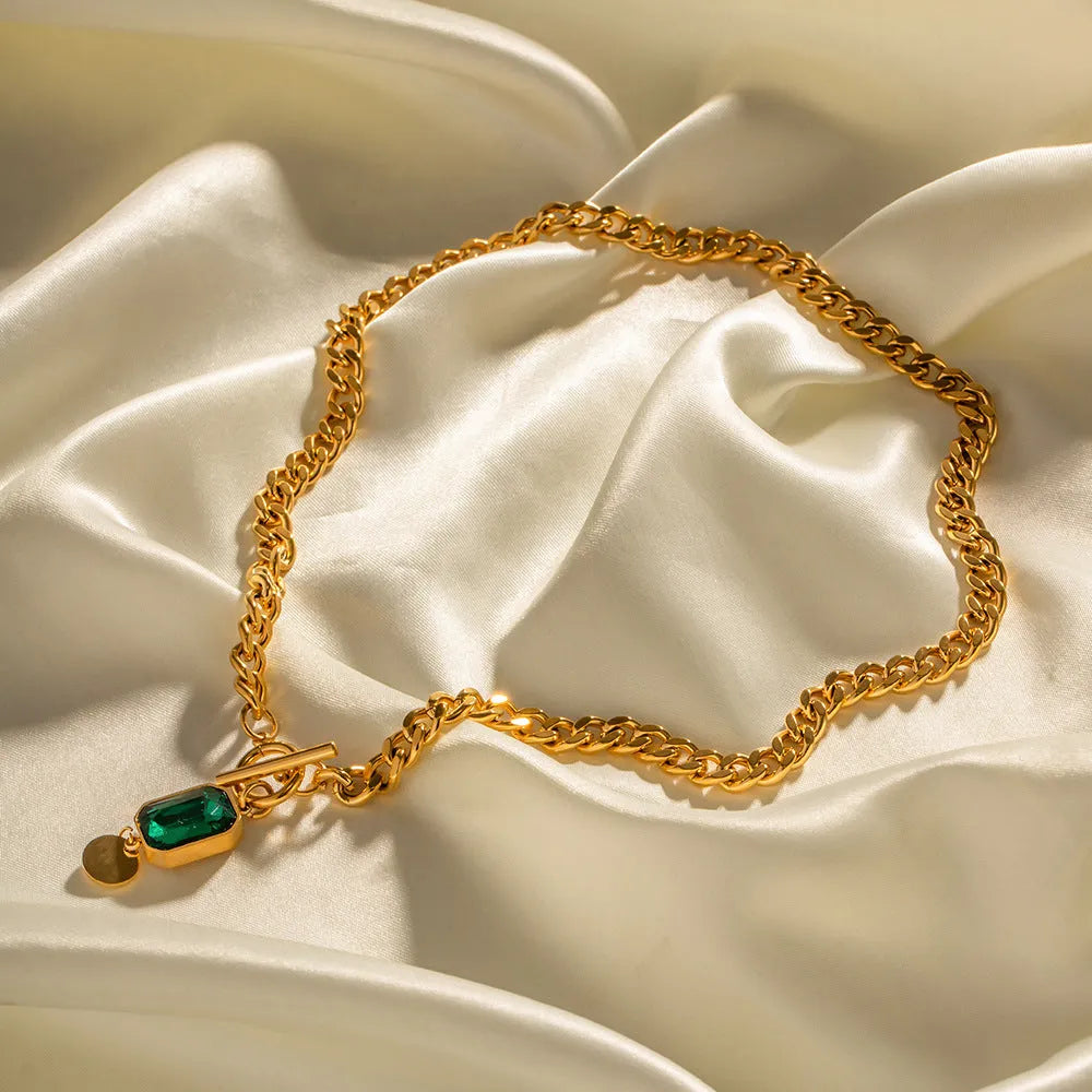 Gold plated titanium steel necklace with emerald zircon geometric round pendant on Cuban link chain