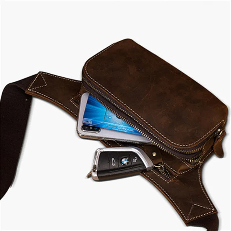 Brown top layer cowhide men's sports waist bag with pull closure, showing size and interior phone pocket.