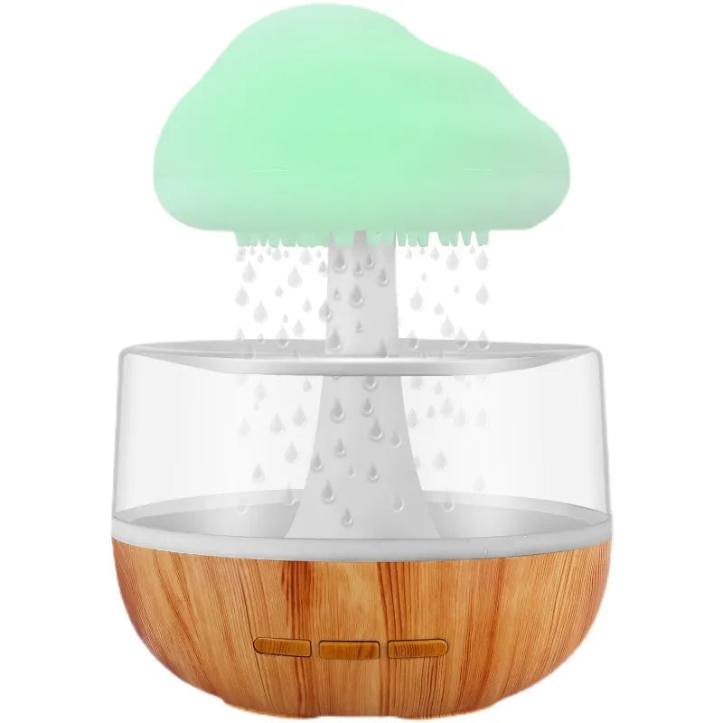 White cloud-shaped humidifier with LED night light on a table