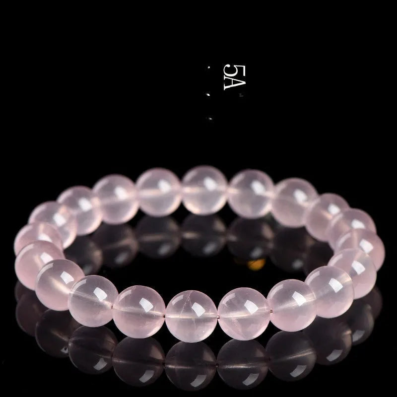 Natural starlight crystal round bead bracelet in pink with polished finish
