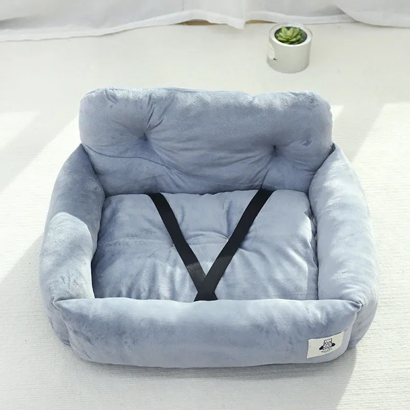 Car-mounted pet outing nest in stain-resistant cloth showing grey and blue plaid colour options