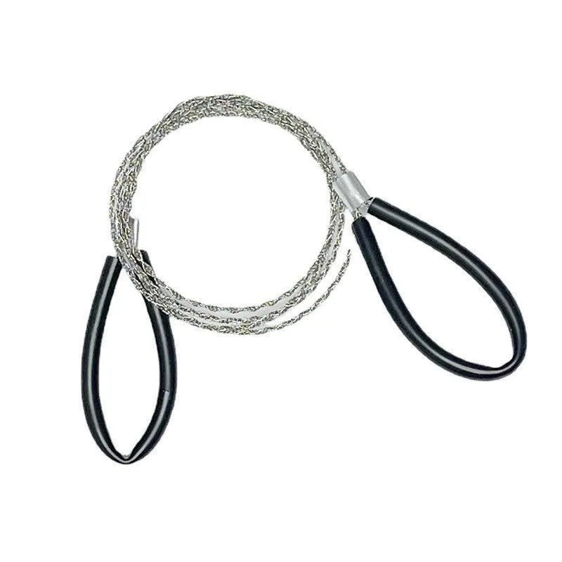 A coiled black or red survival wire saw made of braided stainless steel, shown with a scale indicating its small size.