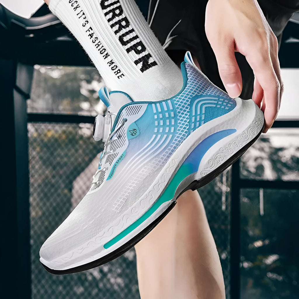 Men's white and blue mesh sneaker with rotating buckle and rubber sole on a plain background.