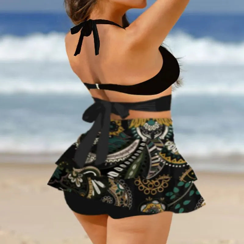Purple high-waisted women's bikini swimsuit with lace-up detail and split skirt, showing backless design