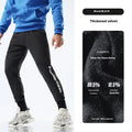 Men's grey sweatpants with adjustable ankle ties and mid waist, shown in folded and flat lay views