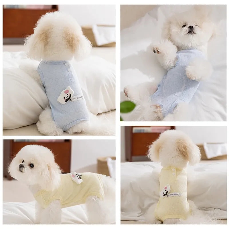 Breathable mesh pet shirt for small dogs and cats in blue or yellow with cat patch and button closure.