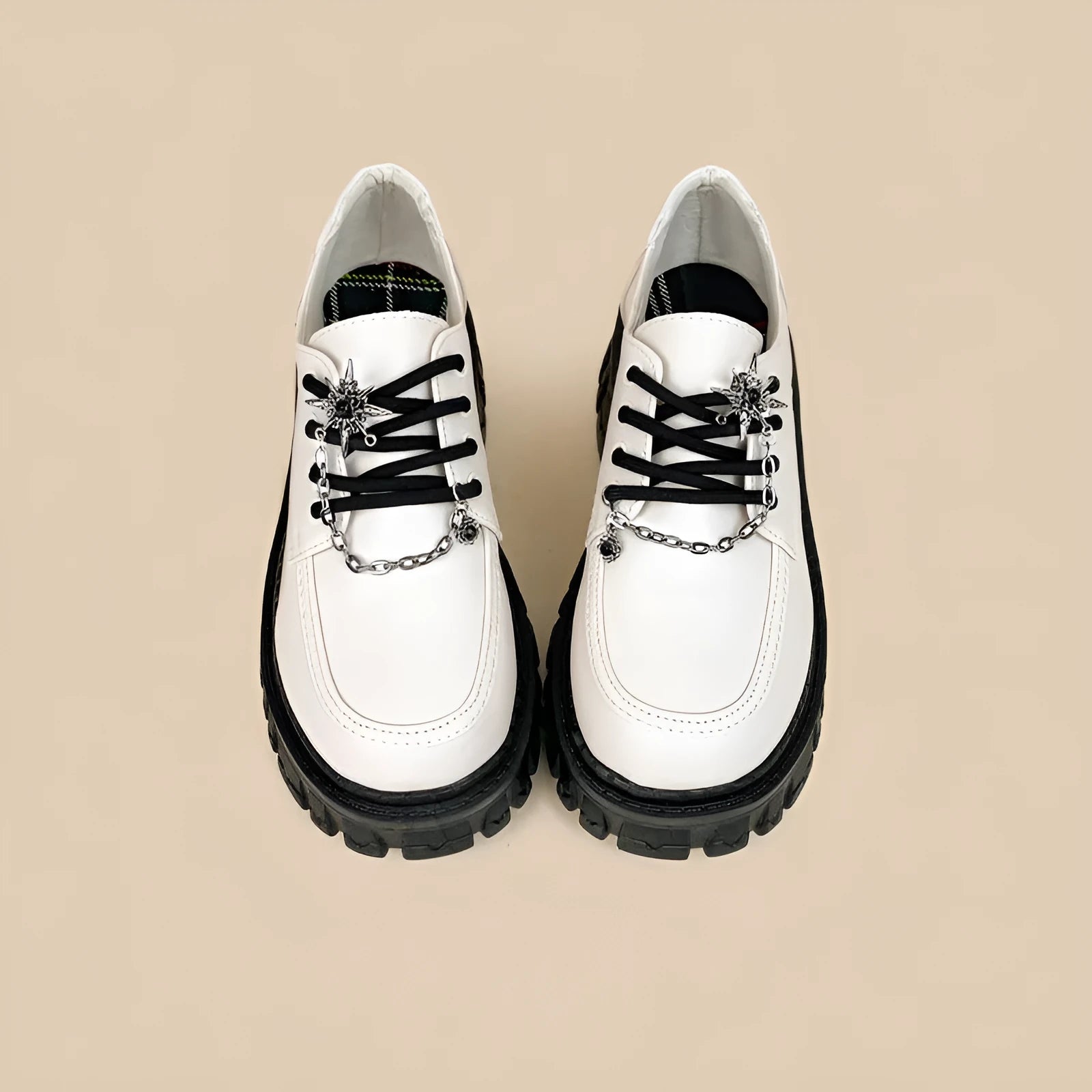 Women's preppy style loafers in Duke Asterism colour with metal cross shoulder strap and round toe