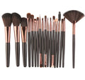 18-piece makeup brush set showing various brush types including fan-shaped brushes for contouring