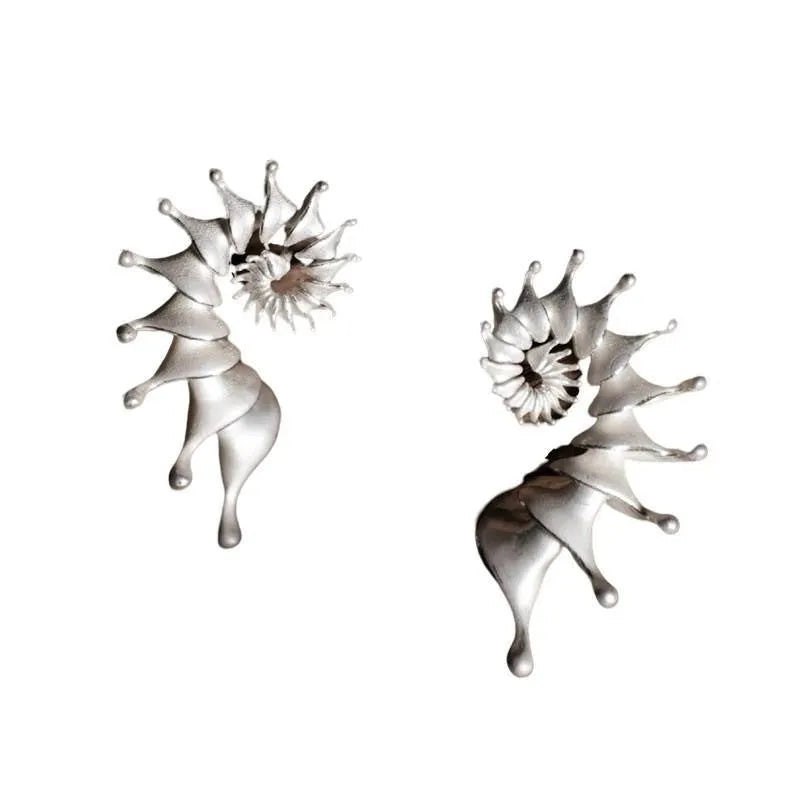 Matte finish alloy conch stud earrings with three-dimensional design and irregular shape